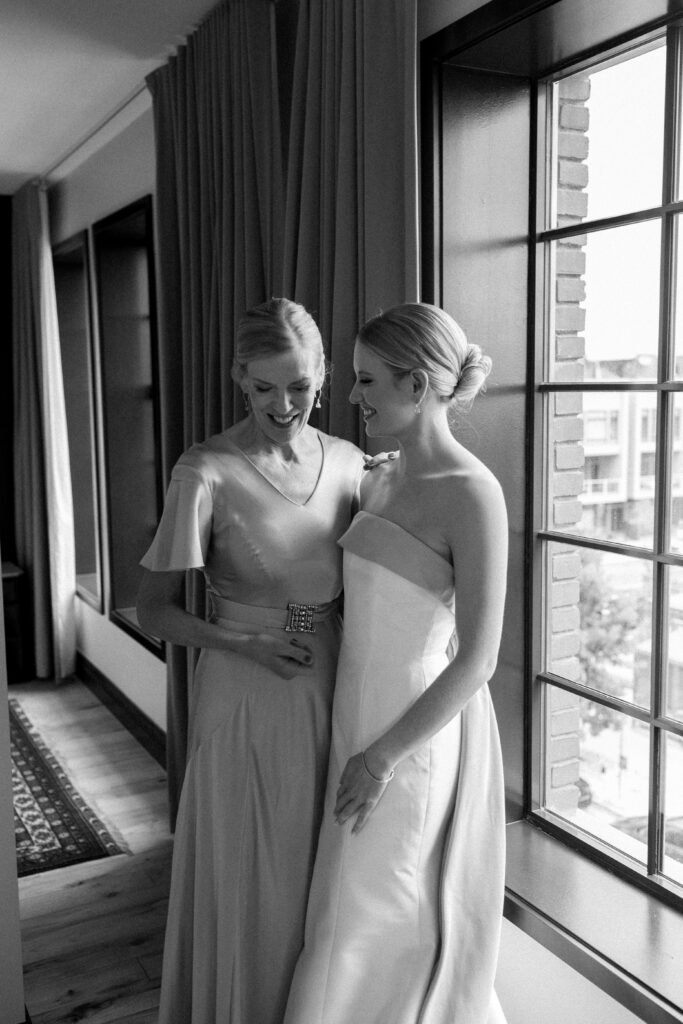 Bride and mother getting ready together at The Ramble Hotel in Denver, Colorado