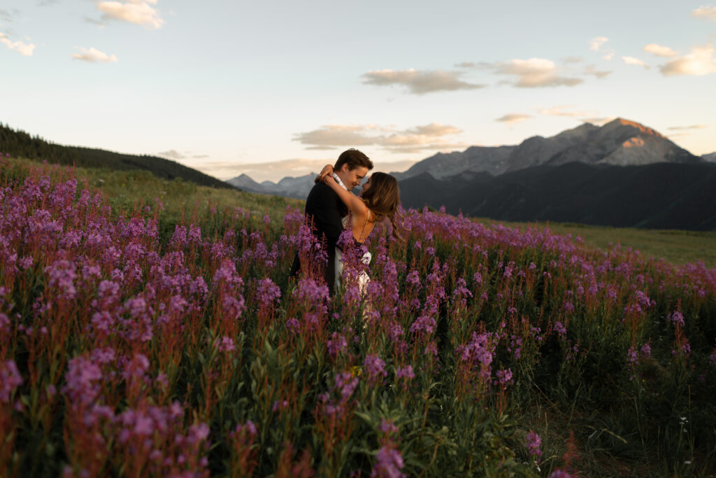 aspen elopement bride and groom in colorado wildflowers