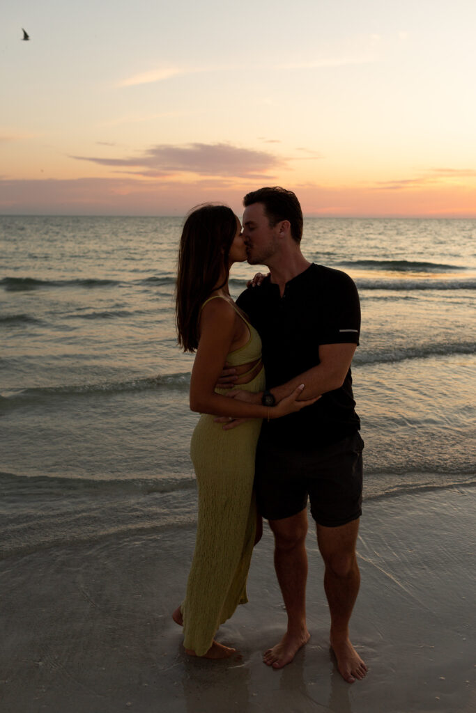couple sunset photoshoot on anna maria island in florida