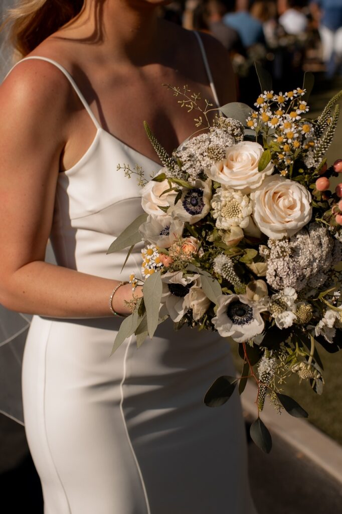 Close-up of wildflower bouquet at intimate California backyard wedding