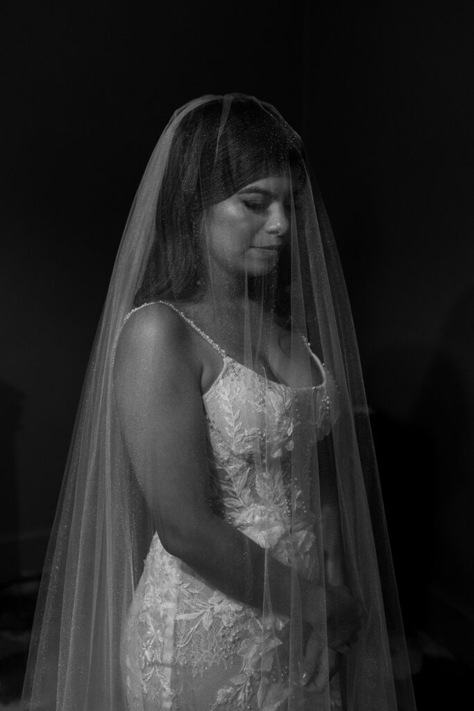 bride with veil overhead getting ready for wedding at colubmia gorge hotel and spa