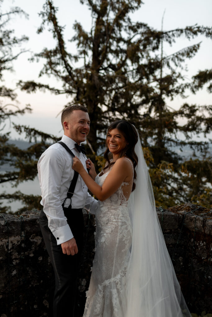 bride and groom smiling at sunset at oregon wedding