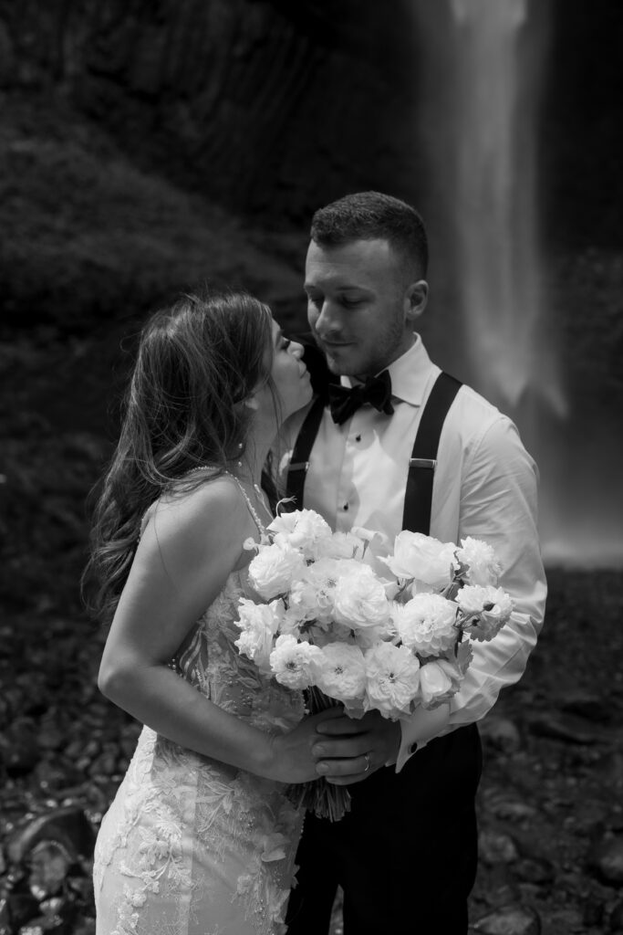 wedding photography in the pacific northwest of couple at waterfall