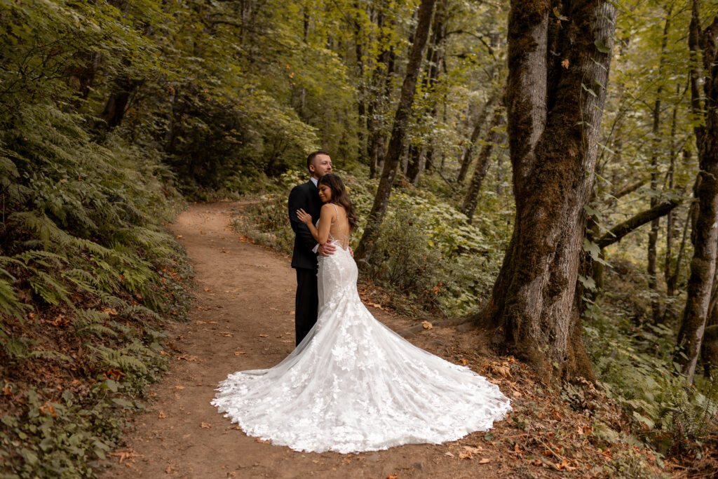 bride and groom in oregon trees