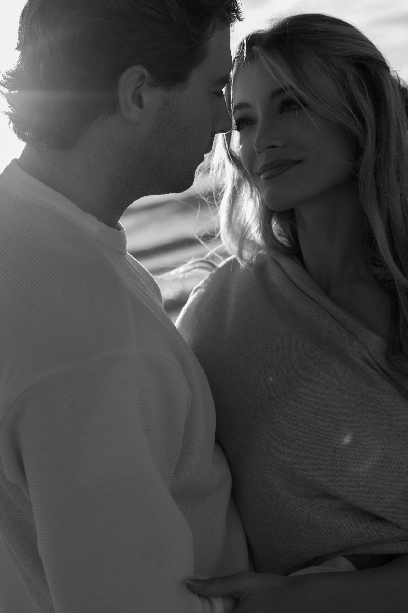 couple in love smiling at the beach in florida